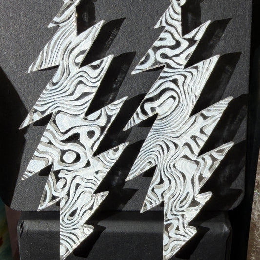 Lazy Lightning Swirl | Grateful Dead 13-Bolt Earrings | swirl pattern silver mirror