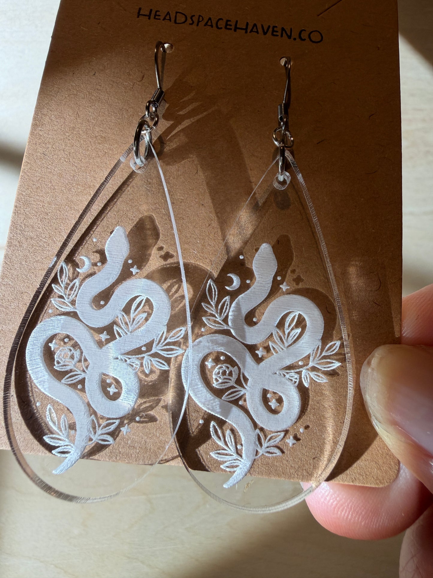 Celestial Snake Clear Acrylic Teardrop Earrings | Mystical Moon and Floral Engraved Dangles