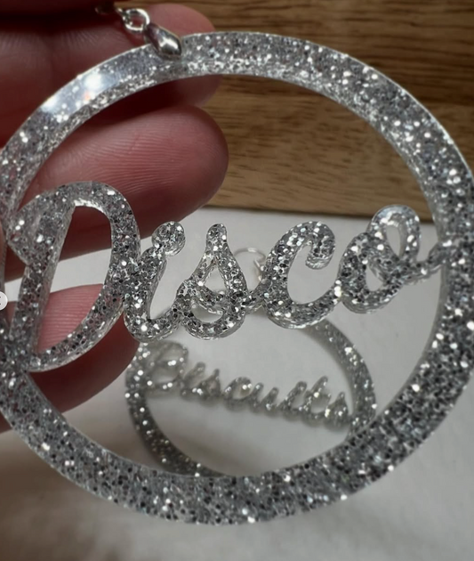 Disco Biscuits Script Earrings – Silver Glitter